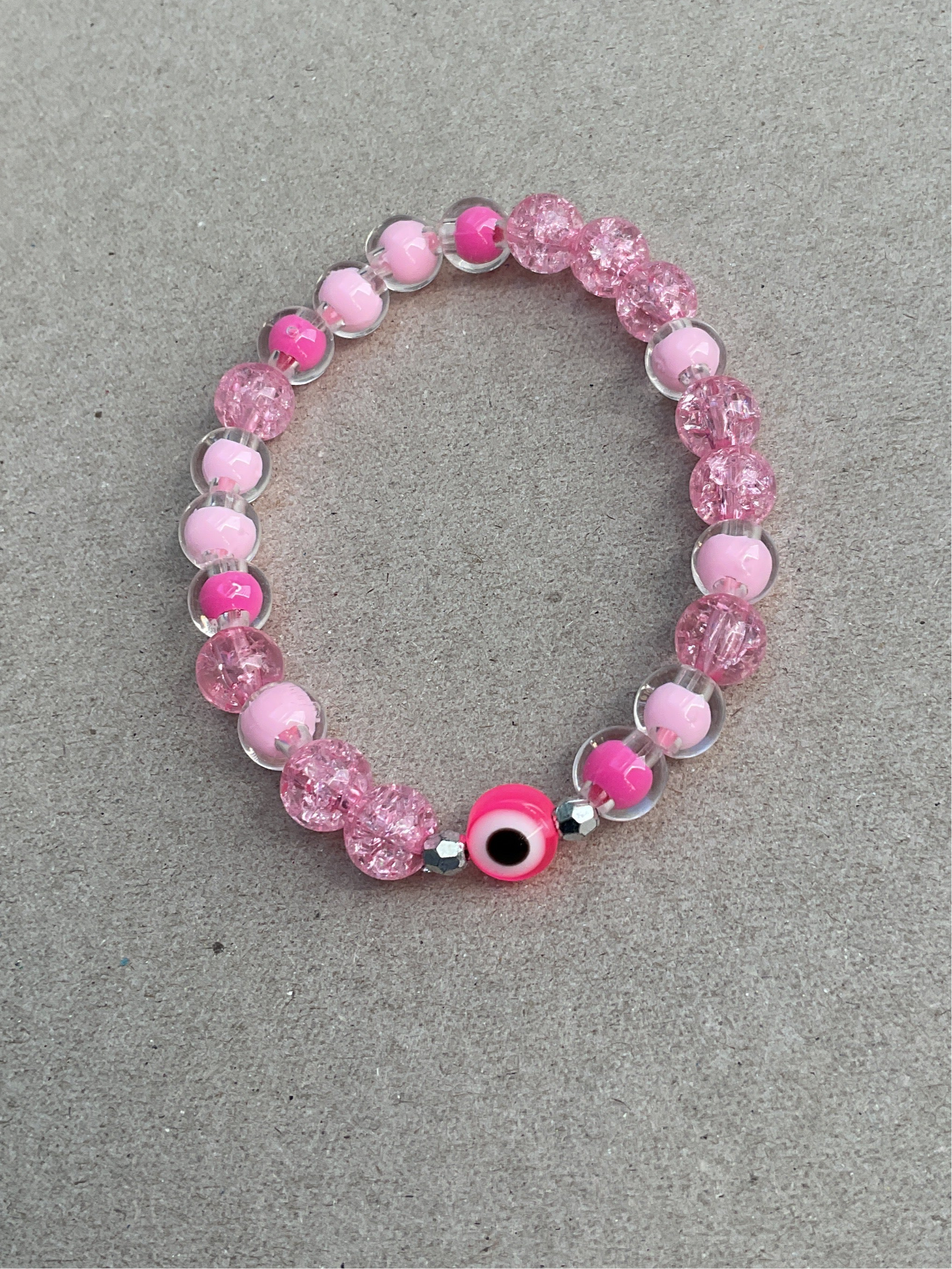 Pink evil eye
