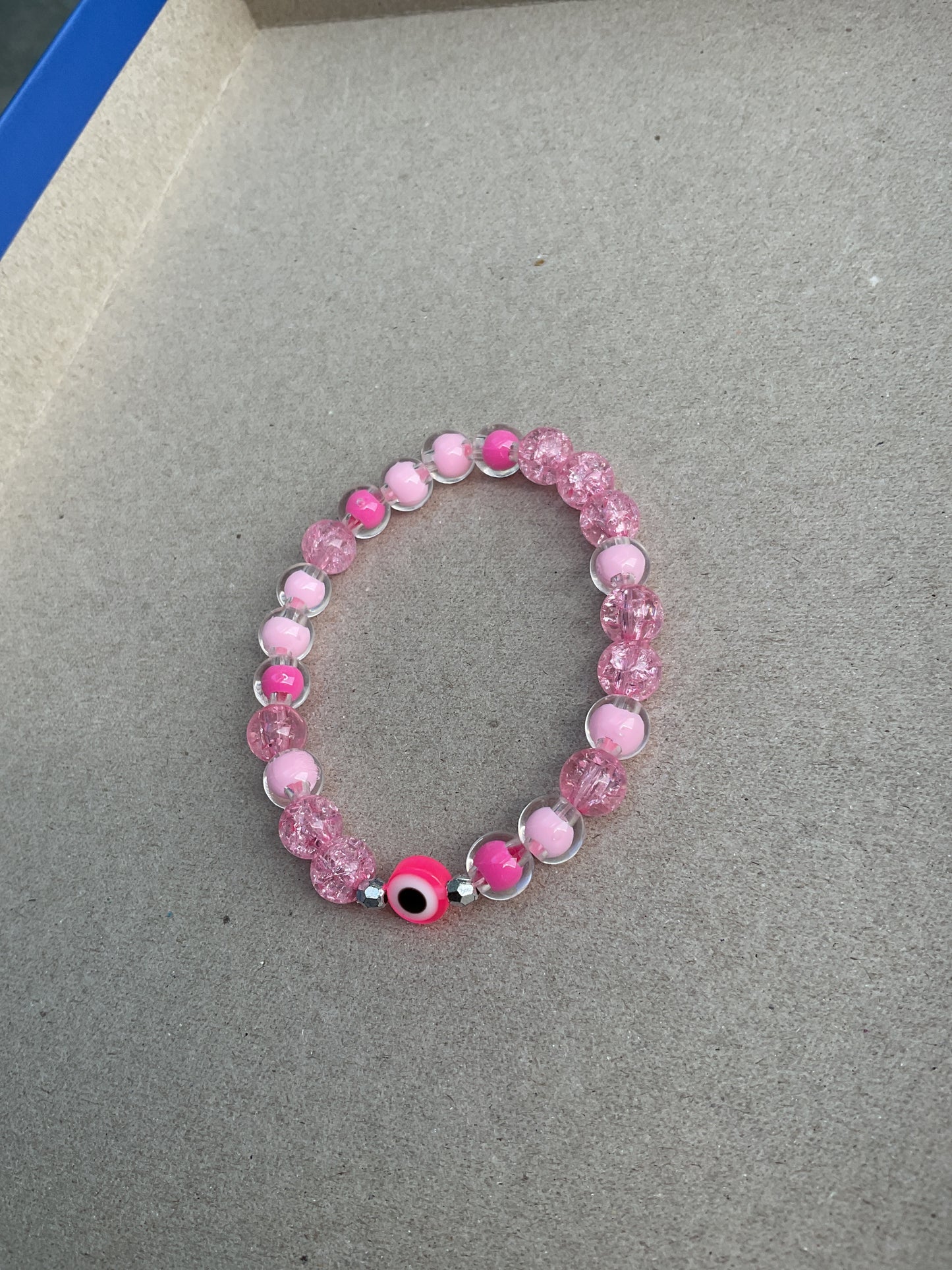 Pink evil eye