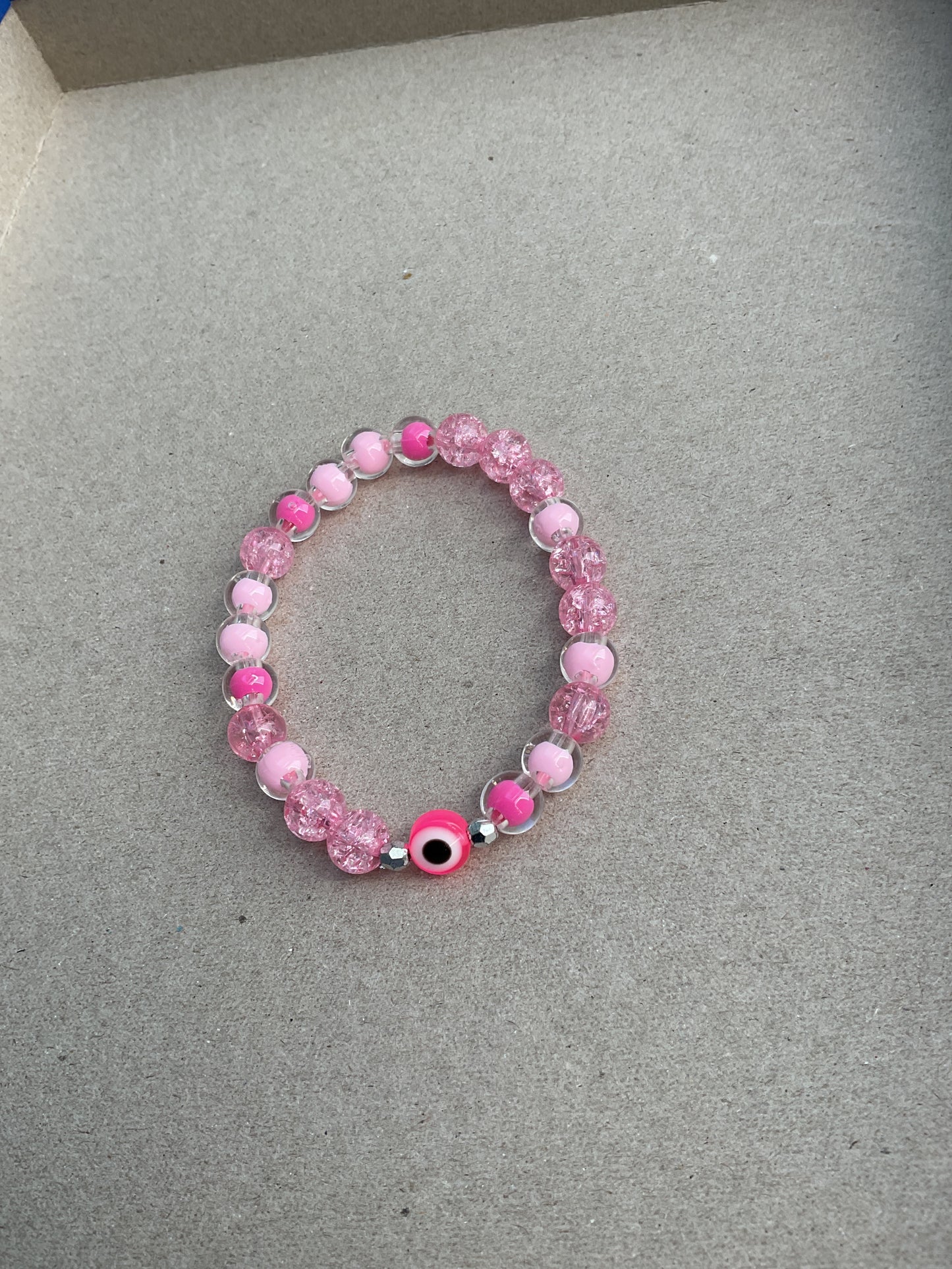 Pink evil eye
